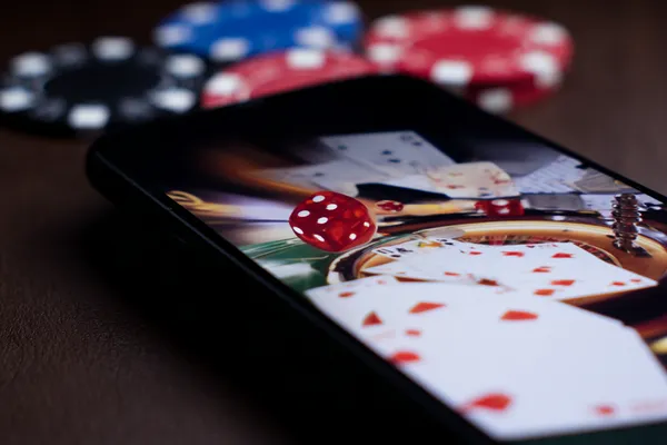 A glamorous woman holding casino chips in a neon-lit environment, representing the premium online casino atmosphere of BEFFURY.