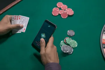 A close-up shot of golden coins falling around a spinning roulette wheel, representing immersive casino action at BEFFURY.